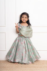 Adorable pastel Green lehenga with delicate silver and pink floral embroidery, perfect for festive occasions. - Kirti Agarwal