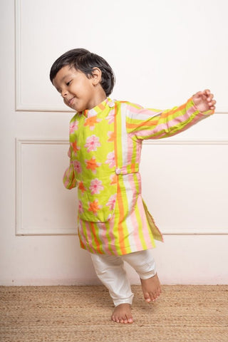 Bright lime green floral printed kurta with off - white pants, a fun and vibrant choice for your little one’s festive wardrobe - Kirti Agarwal