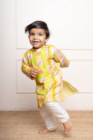 Bright lime green floral printed kurta with off - white pants, a fun and vibrant choice for your little one’s festive wardrobe - Kirti Agarwal