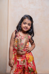 Brighten every festive moment with this embroidered Crepe Chinnon top and floral brocade palazzo set — perfect for your little fashionista - Kirti Agarwal