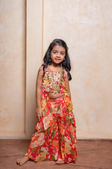 Brighten every festive moment with this embroidered Crepe Chinnon top and floral brocade palazzo set — perfect for your little fashionista - Kirti Agarwal