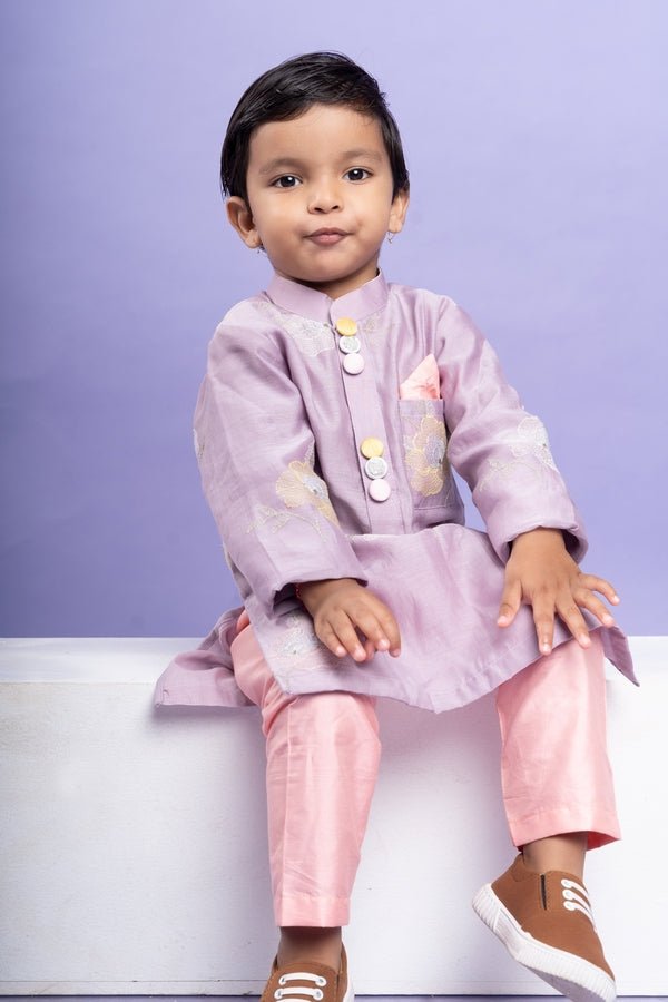 Charming lavender kurta with delicate floral embroidery paired with Peach pants, perfect for festive occasions - Kirti Agarwal