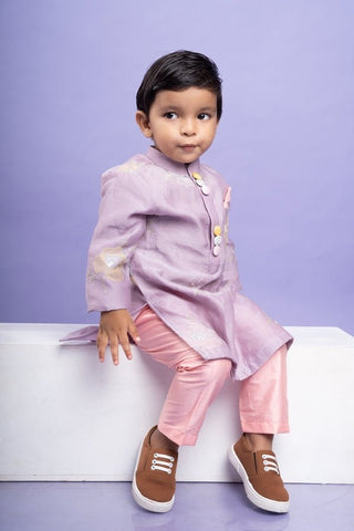 Charming lavender kurta with delicate floral embroidery paired with Peach pants, perfect for festive occasions - Kirti Agarwal