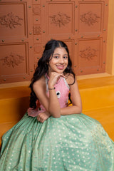 Charming silk and organza satin lehenga set for girls with pink mirror - work halter top and green woven flare skirt – perfect kids ethnic wear for weddings and festive occasions - Kirti Agarwal