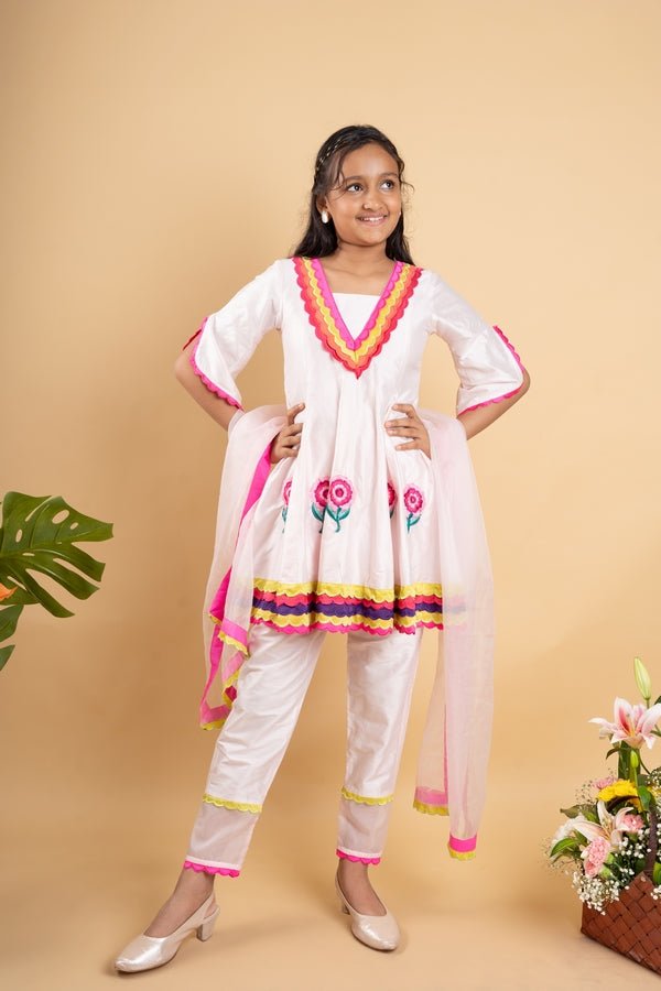 Charming white kurta set with colorful scalloped details and floral embroidery, perfect for festive occasions - Kirti Agarwal