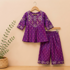 Elegant purple silk kurta palazzo set with intricate embroidery and beautiful embroidered animal motifs on the sleeves