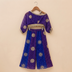 Elegant blue and purple Bandhini-print Georgette set featuring a stylish one-shoulder top with statement sleeves and a flowy Palazzo