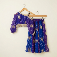 Elegant blue and purple Bandhini-print Georgette set featuring a stylish one-shoulder top with statement sleeves and a flowy Palazzo