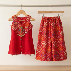Elegant Hand-Embroidered Silk Short Kurta with Flared Palazzo Set for Festive Celebrations.