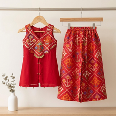 Elegant Hand-Embroidered Silk Short Kurta with Flared Palazzo Set for Festive Celebrations.