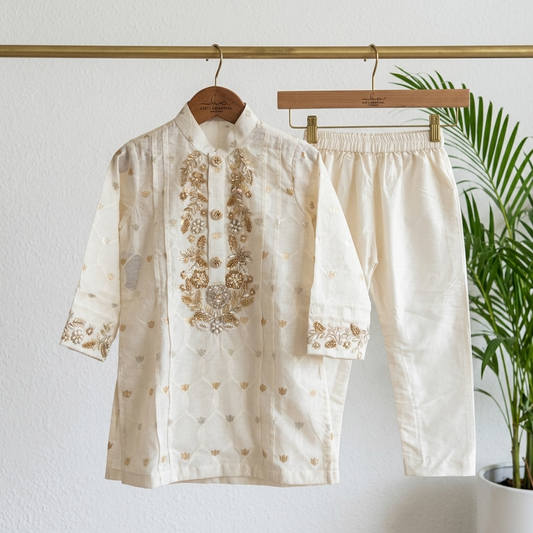 Elegant Off-White Embroidered Kurta Set.
