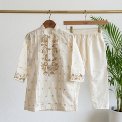 Elegant Off-White Embroidered Kurta Set.