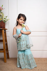 Elegant aqua blue sharara set with intricate mirror work and embroidery, perfect for festive occasions and celebrations - Kirti Agarwal
