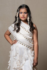 Elegant ivory one - shoulder gown with cascading ruffles and sequin embellishments, perfect for making a chic statement at any special occasion - Kirti Agarwal