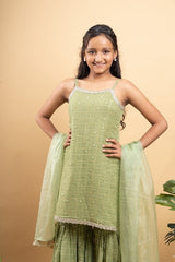 Elegant light Green sleeveless kurti with sequin details, paired with matching sharara pants and a sheer dupatta - Kirti Agarwal