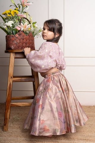 Elegant light Lavender top with white floral embroidery paired with a floral patterned pink lehenga for festive charm - Kirti Agarwal