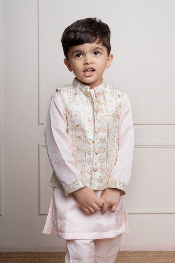 Elegant pastel pink kurta set with an intricately embroidered ivory jacket, perfect for festive occasions - Kirti Agarwal