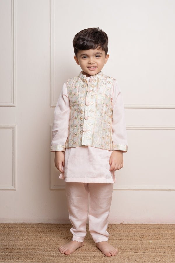 Elegant pastel pink kurta set with an intricately embroidered ivory jacket, perfect for festive occasions - Kirti Agarwal