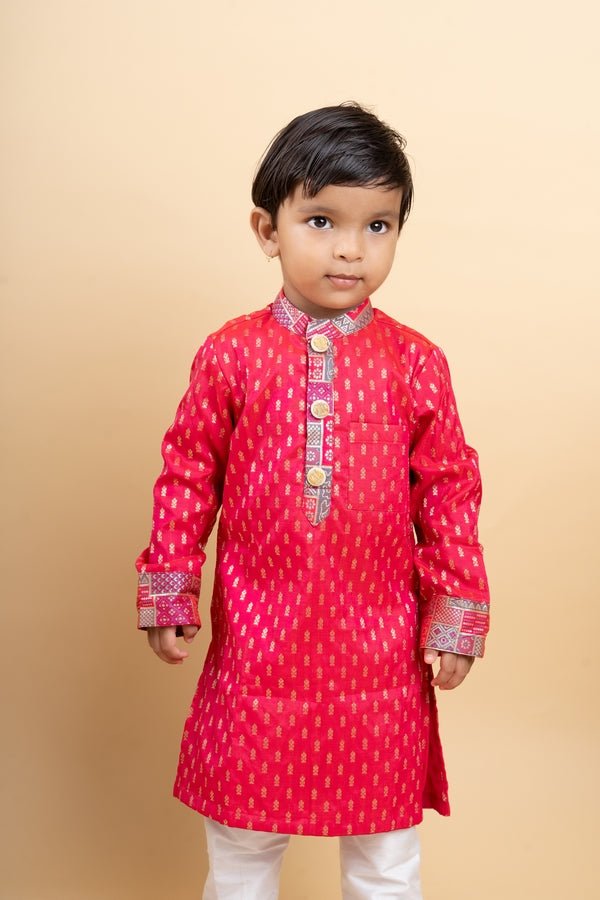 Elegant red kurta with golden embroidery paired with classic white pants, perfect for festive celebrations - Kirti Agarwal