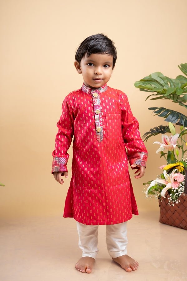 Elegant red kurta with golden embroidery paired with classic white pants, perfect for festive celebrations - Kirti Agarwal