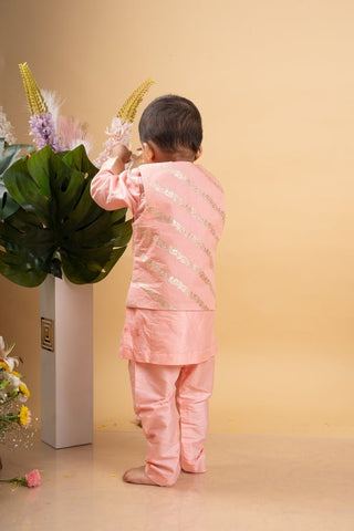 Elegant soft Peach kurta set with a regal golden - detailed jacket for a charming festive look - Kirti Agarwal