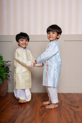 Elegant yellow embroidered kurta with dhoti & Refined powder blue kurta set with mirror work - Kirti Agarwal