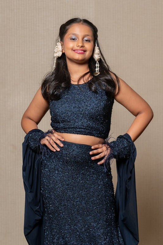 Exquisite navy blue crop top and Lahenga with intricate beadwork and dramatic sleeves, perfect for making a sophisticated statement at formal events. - Kirti Agarwal