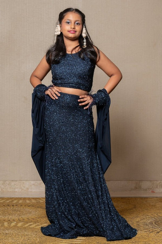 Exquisite navy blue crop top and Lahenga with intricate beadwork and dramatic sleeves, perfect for making a sophisticated statement at formal events. - Kirti Agarwal