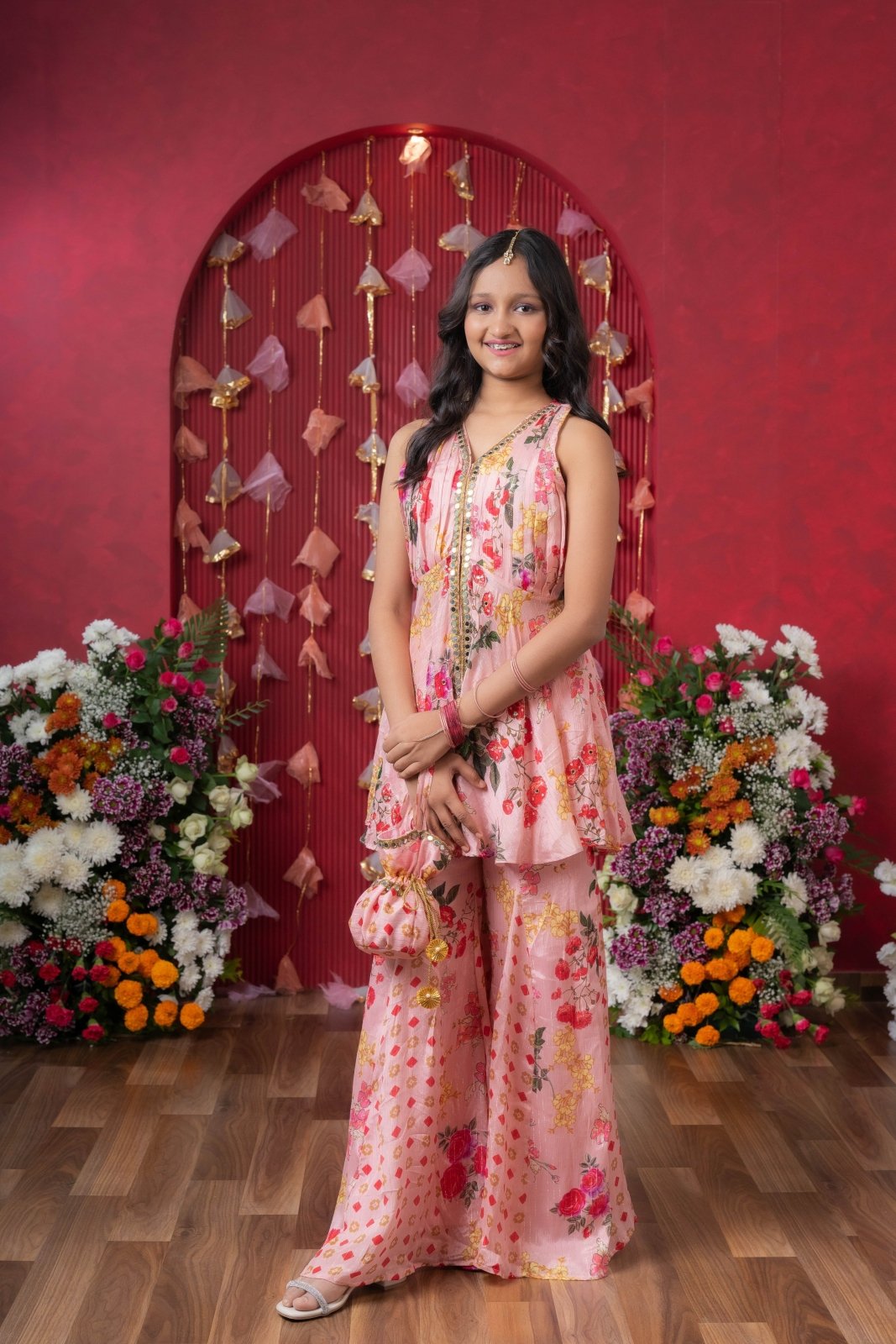 Floral Elegance: A chic peplum set with matching potli for festive charm - Kirti Agarwal