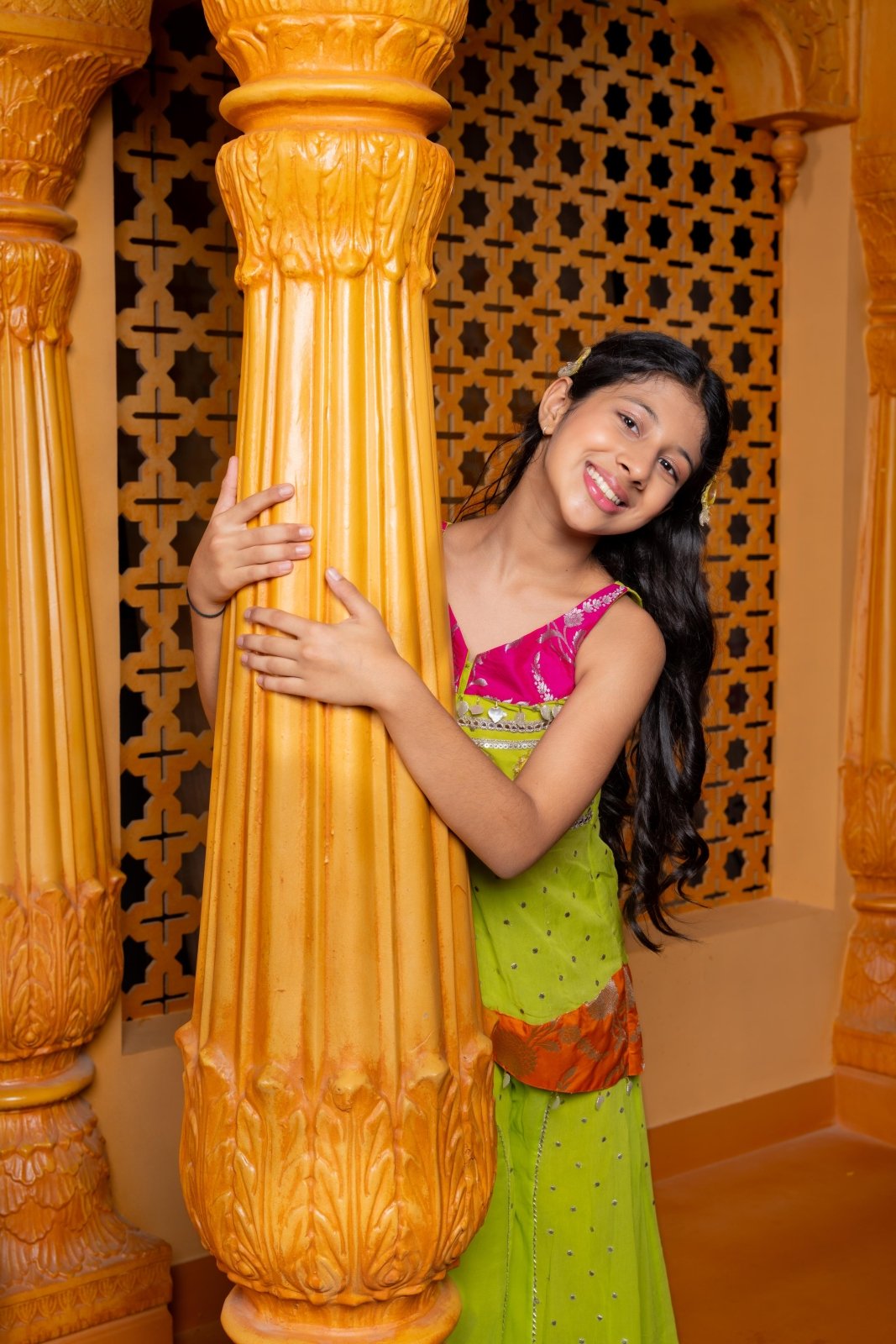 Girls festive sharara set in vibrant pink and lime green, crafted in soft Georgette with Brocade Silk accents, featuring mirror work, sequins, and elegant detailing – perfect ethnic wear for weddings, parties, and celebrations - Kirti Agarwal