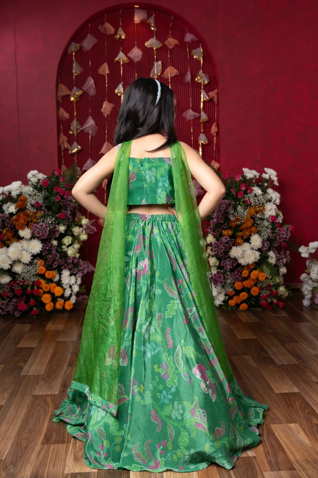 Grace your festivities with this vibrant green lehenga set, featuring floral embroidery and a flowy printed skirt - Kirti Agarwal