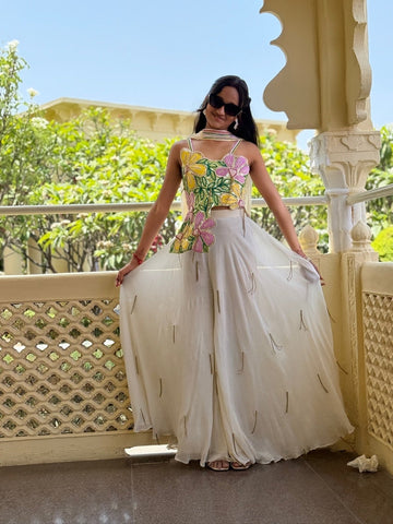 Handcrafted floral georgette set with intricate embroidery and elegant flow — perfect for festive flair.