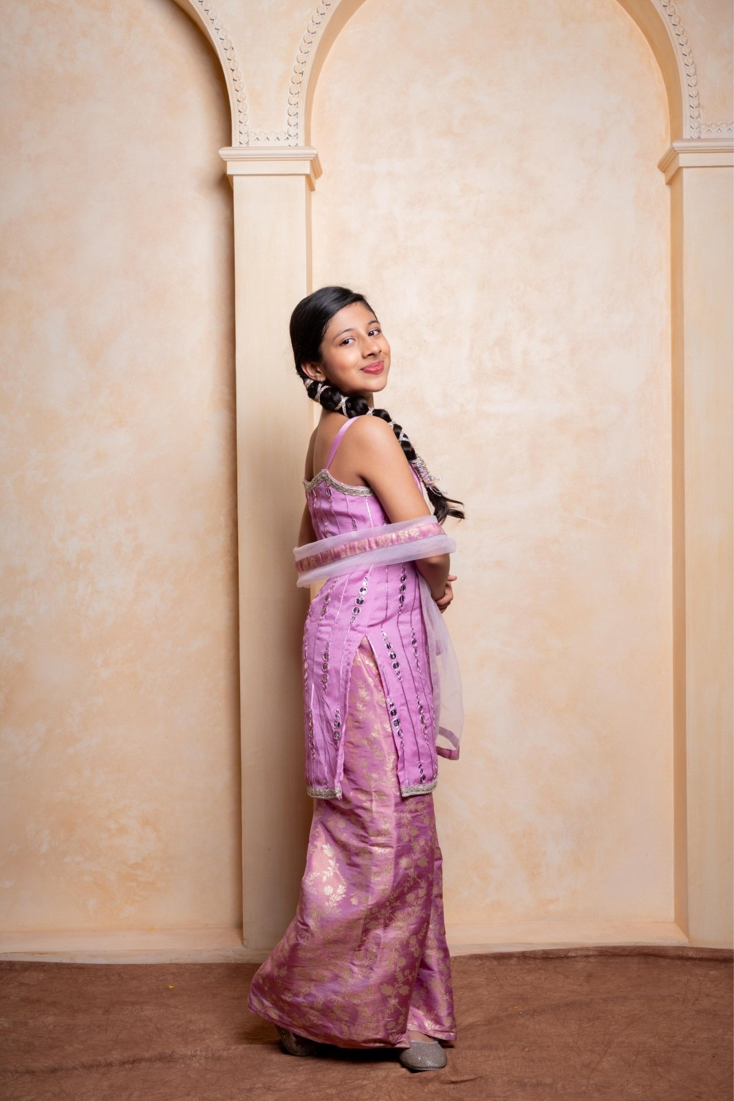 Make your princess shine in this embroidered Chinnon silk kurti, brocade sharara, and net dupatta set – perfect for festive celebrations - Kirti Agarwal