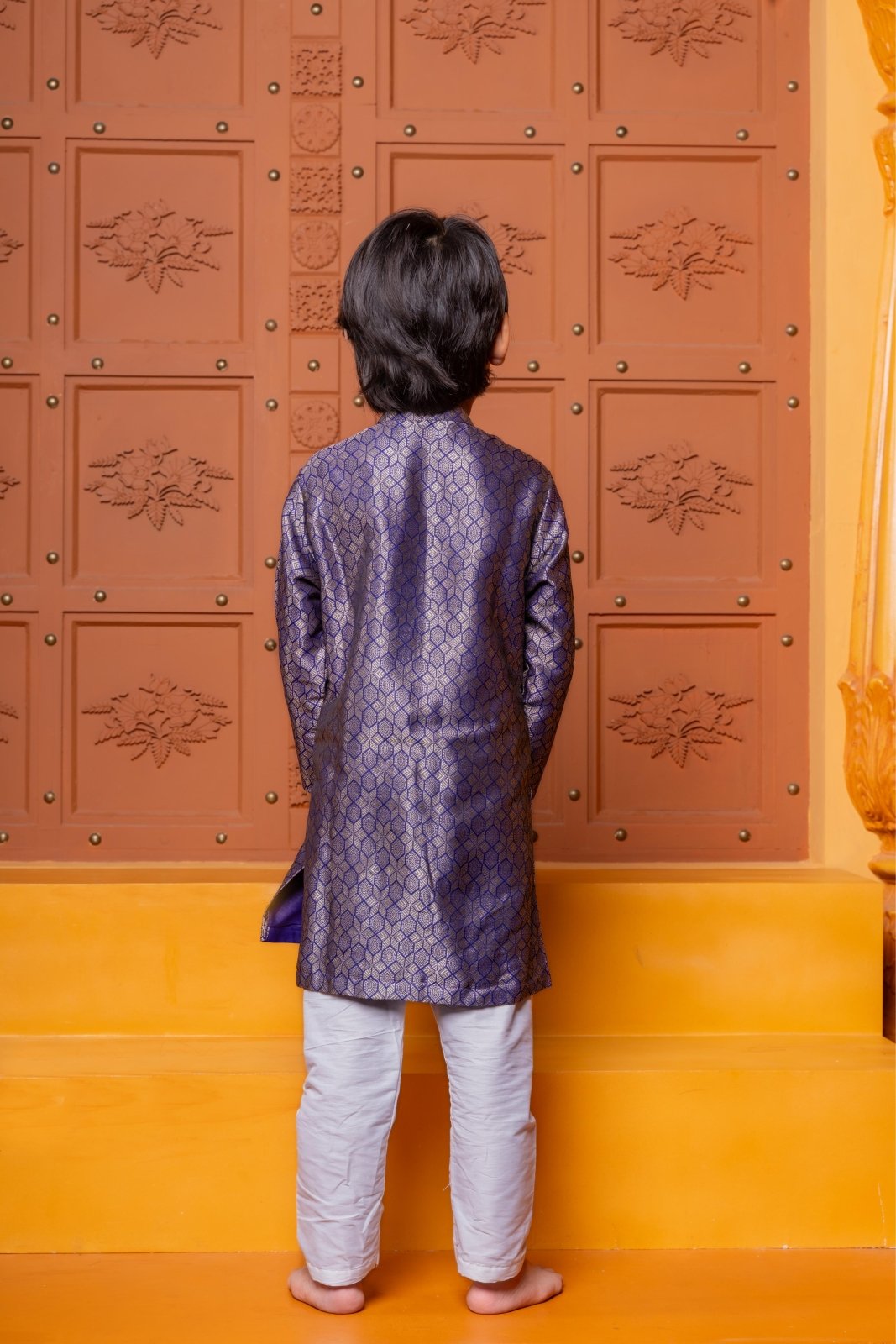 Royal purple silk kurta with white churidar – a perfect ethnic outfit for boys to shine at weddings and festive celebrations - Kirti Agarwal