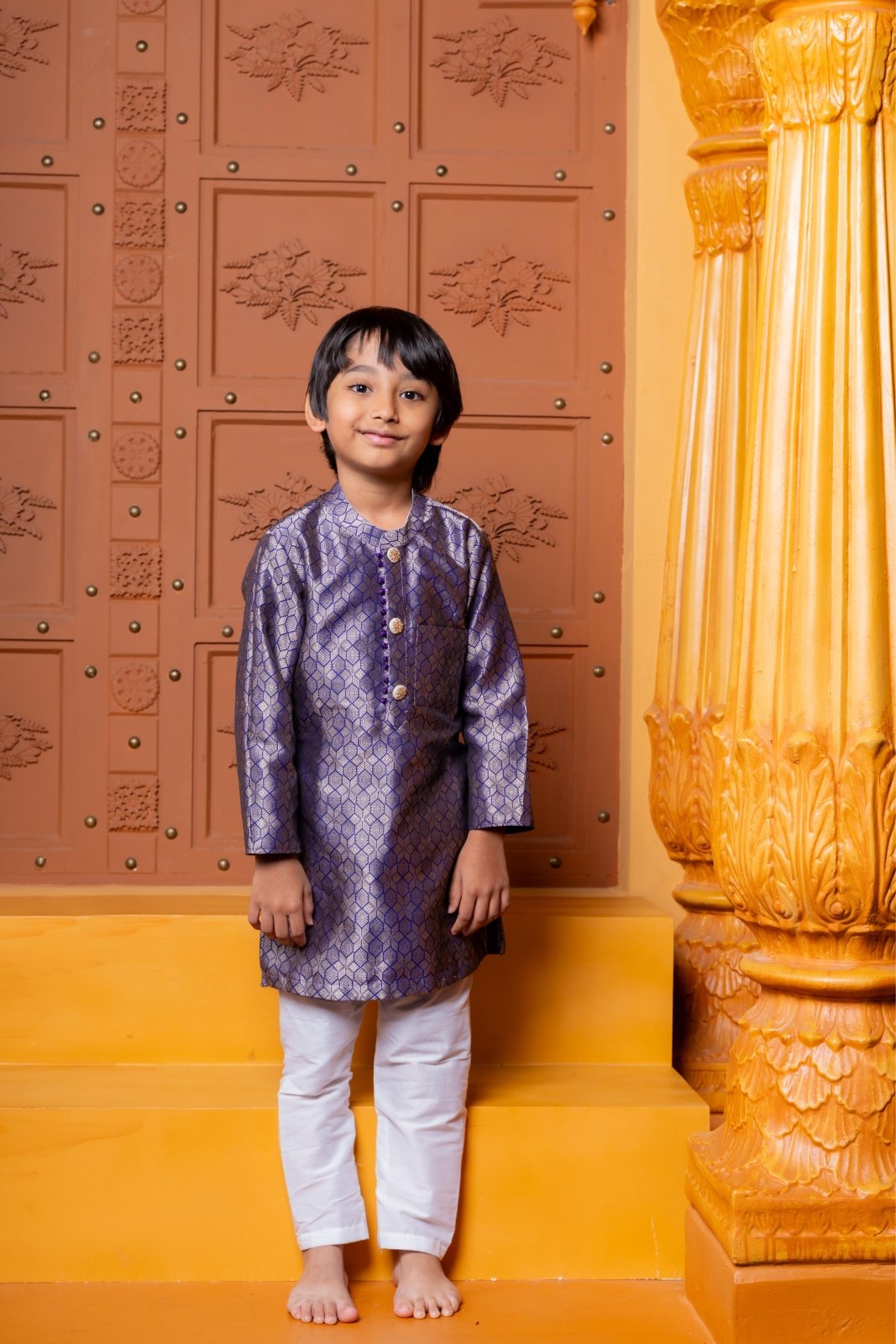 Royal purple silk kurta with white churidar – a perfect ethnic outfit for boys to shine at weddings and festive celebrations - Kirti Agarwal