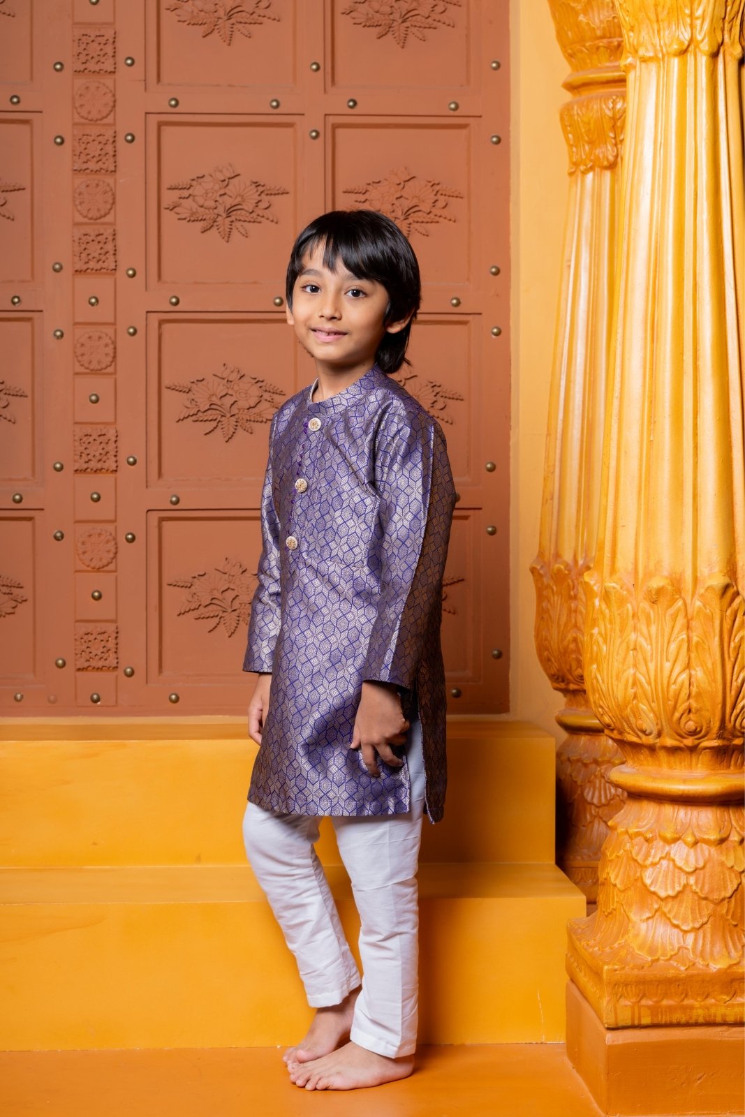 Royal purple silk kurta with white churidar – a perfect ethnic outfit for boys to shine at weddings and festive celebrations - Kirti Agarwal
