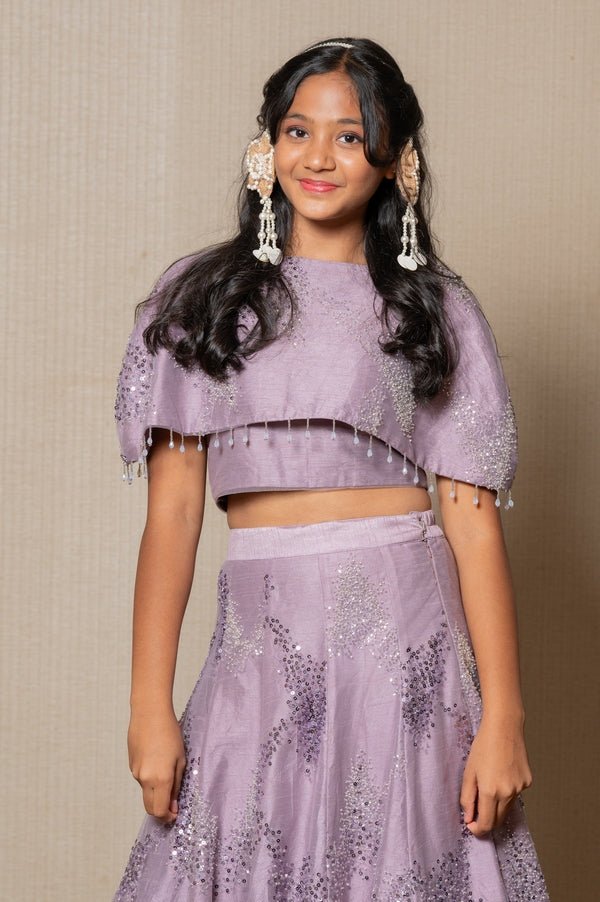 Stunning lilac ensemble with sequin embellishments and a flowing Lahenga, perfect for a graceful and elegant look at any special occasion. - Kirti Agarwal