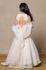 Stunning off - white gown with intricate beadwork and a flowing silhouette, perfect for making a graceful statement at any formal event. - Kirti Agarwal