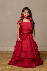 Stunning red gown with a tiered Lahenga and sequined bolero, perfect for making a bold statement at any special occasion. - Kirti Agarwal