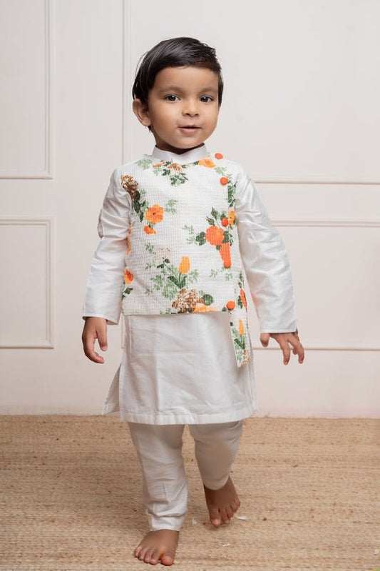 Stylish white kurta set with a attached vibrant floral asymmetrical jacket for a festive and modern look - Kirti Agarwal