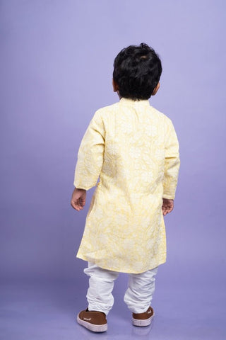 Traditional pink kurta with embroidered yellow jacket and white dhoti pants for a festive and vibrant look - Kirti Agarwal