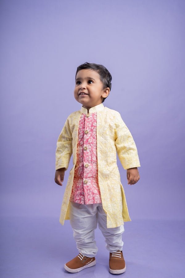 Traditional pink kurta with embroidered yellow jacket and white dhoti pants for a festive and vibrant look - Kirti Agarwal