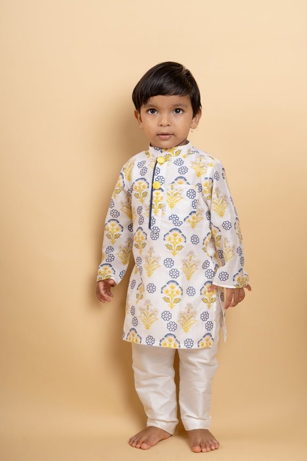 Vibrant floral printed kurta paired with classic white pants, perfect for your little one's festive celebrations - Kirti Agarwal