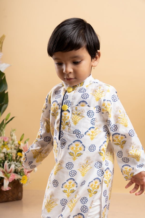 Vibrant floral printed kurta paired with classic white pants, perfect for your little one's festive celebrations - Kirti Agarwal