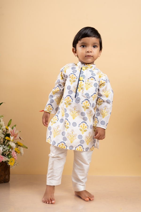 Vibrant floral printed kurta paired with classic white pants, perfect for your little one's festive celebrations - Kirti Agarwal