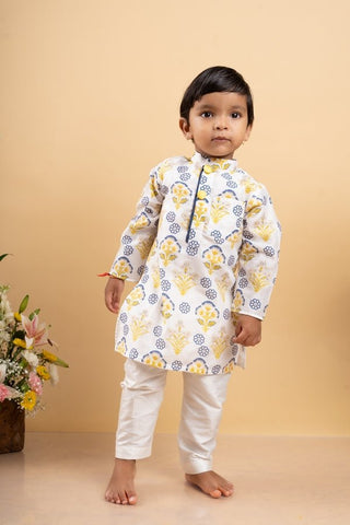 Vibrant floral printed kurta paired with classic white pants, perfect for your little one's festive celebrations - Kirti Agarwal