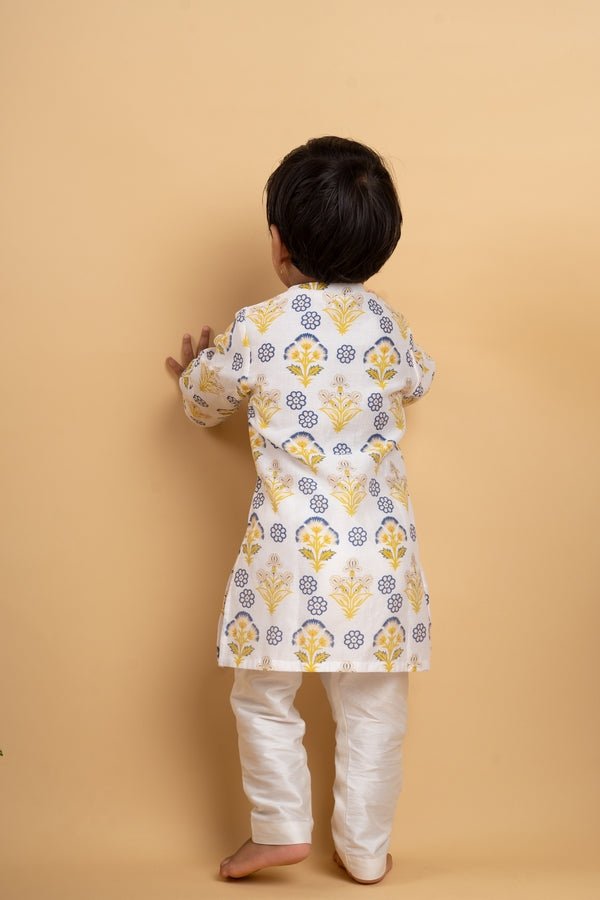 Vibrant floral printed kurta paired with classic white pants, perfect for your little one's festive celebrations - Kirti Agarwal