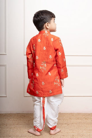 Vibrant orange floral embroidered kurta with white dhoti pants for a traditional festive look - Kirti Agarwal