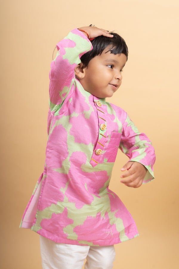 Vibrant pink and green tie - dye kurta paired with classic white pants for a playful yet elegant festive look - Kirti Agarwal