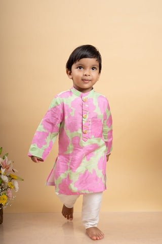 Vibrant pink and green tie - dye kurta paired with classic white pants for a playful yet elegant festive look - Kirti Agarwal